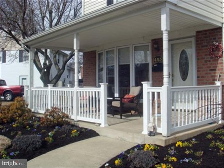 445 Kennerly Road Springfield, PA 19064 - Photo 3 of 9 a view of a porch with a bench