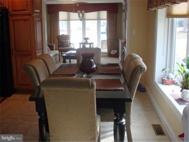 445 Kennerly Road Springfield, PA 19064 - Photo 6 of 9 a living room with furniture and a large window