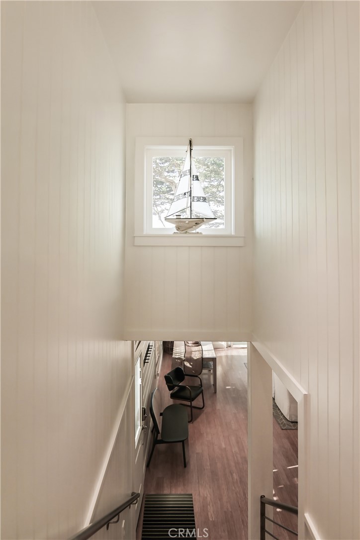 2814 Studio Drive Cayucos, CA 93430 - Photo 18 of 32 a bed sitting in a bedroom next to a window