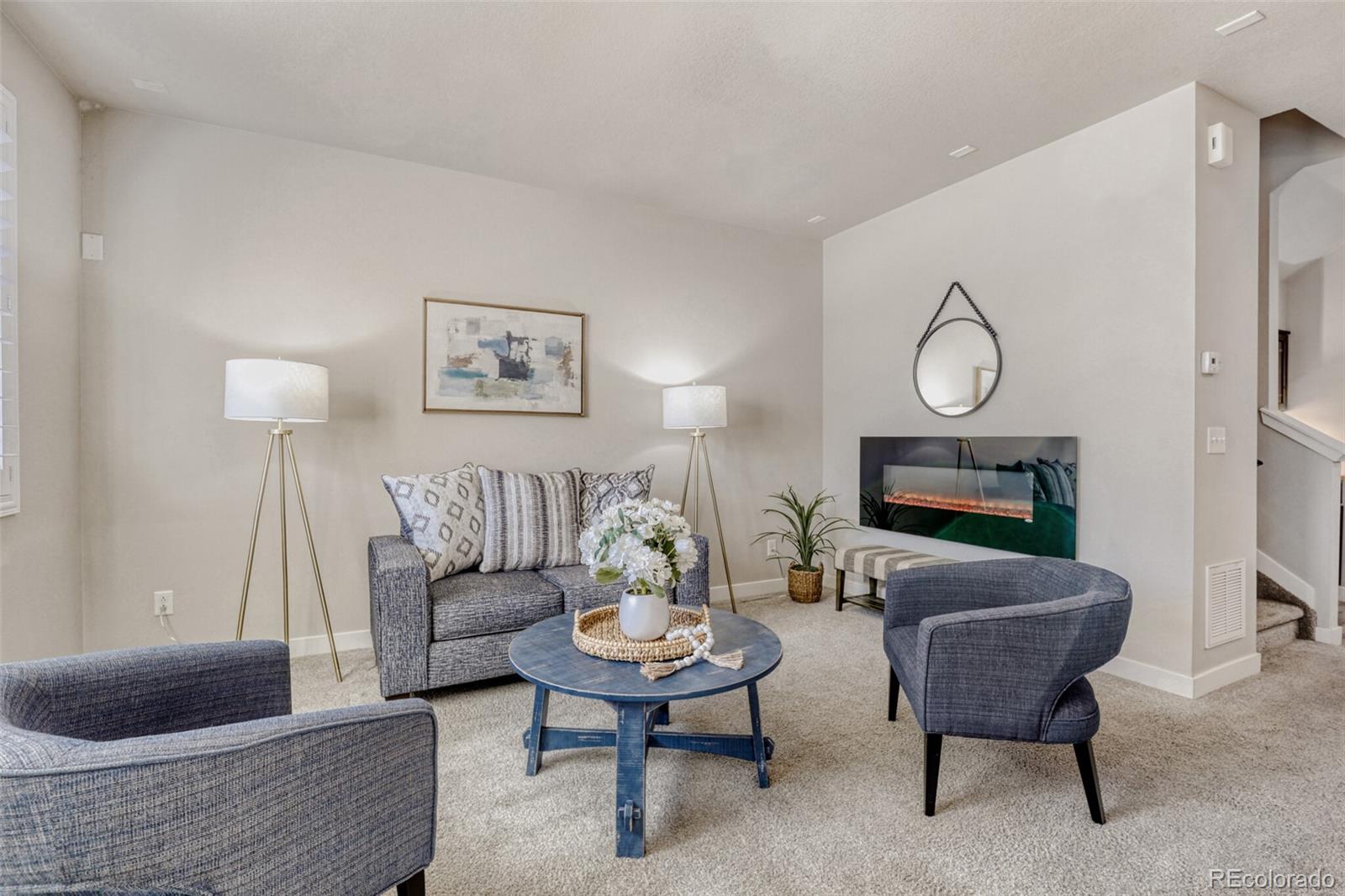 a view of a livingroom with furniture and a couch