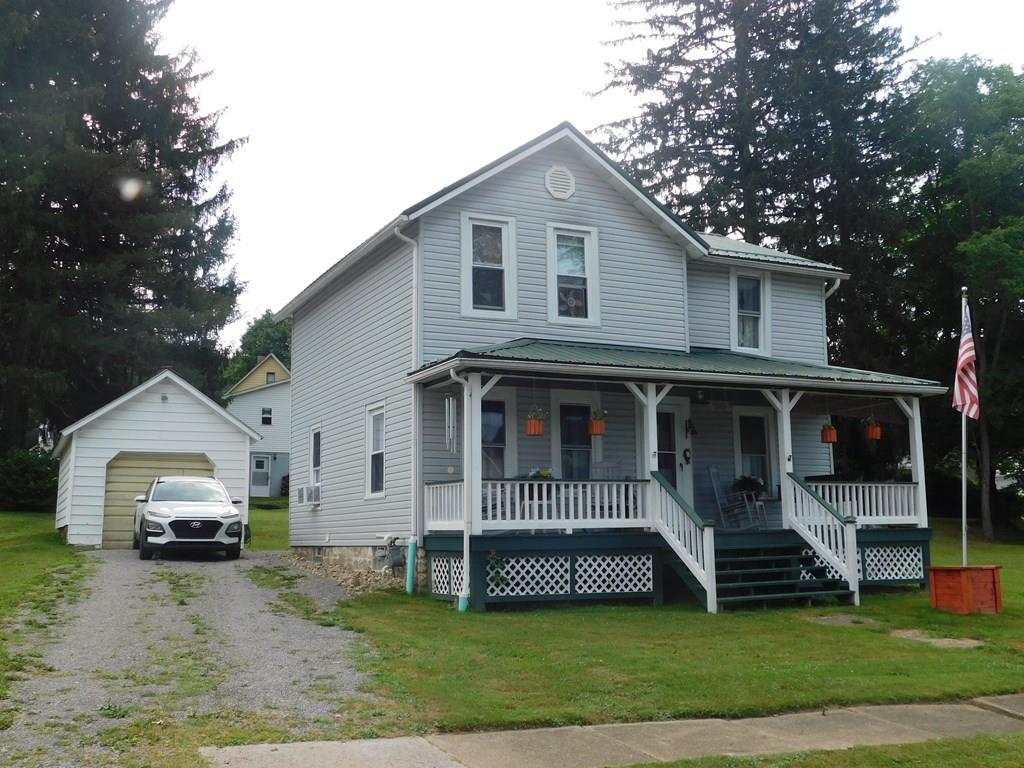 204 1st Avenue Rouseville, PA 16344 - Photo 1 of 37 a view of a house with a patio and a yard
