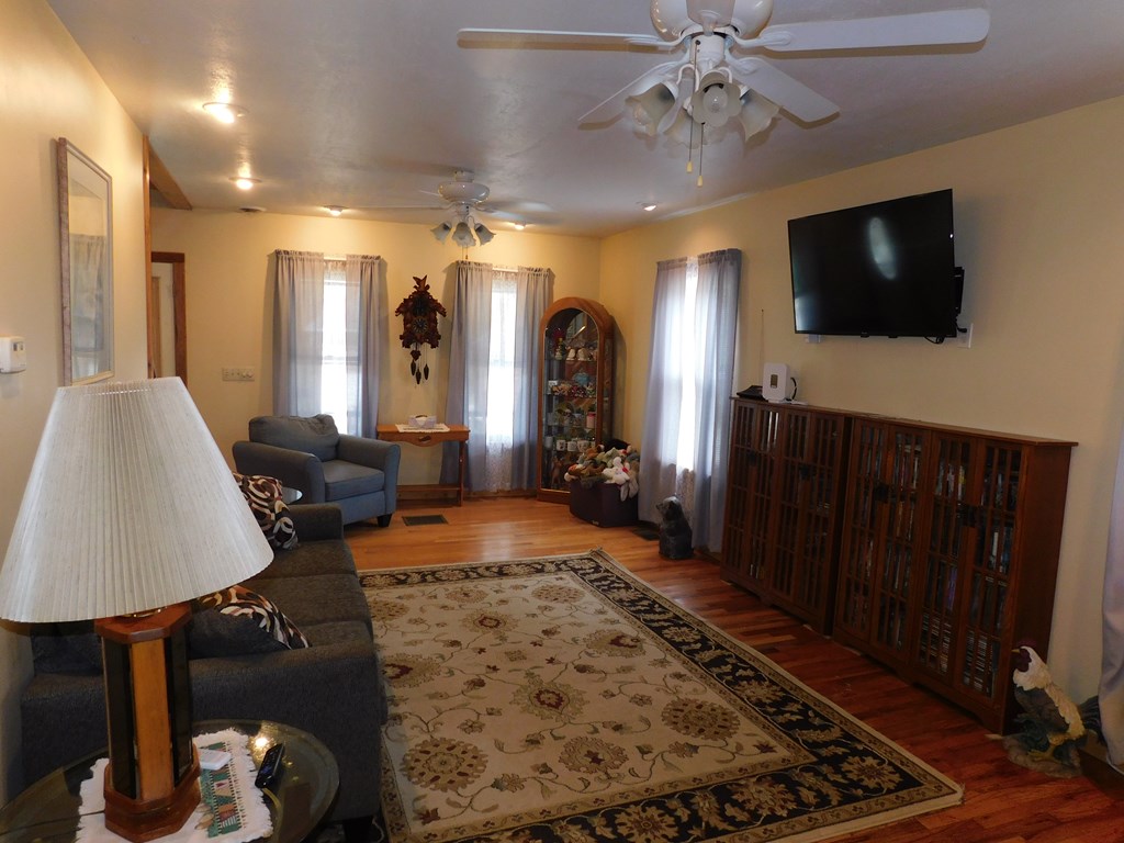204 1st Avenue Rouseville, PA 16344 - Photo 12 of 37 a living room with furniture and a flat screen tv
