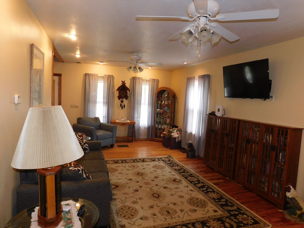 204 1st Avenue Rouseville, PA 16344 - Photo 15 of 37 a living room with furniture and a flat screen tv