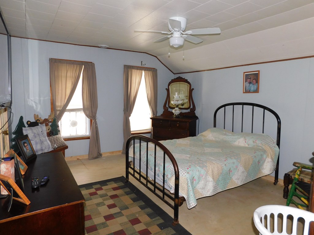 204 1st Avenue Rouseville, PA 16344 - Photo 20 of 37 a bedroom with a bed and window