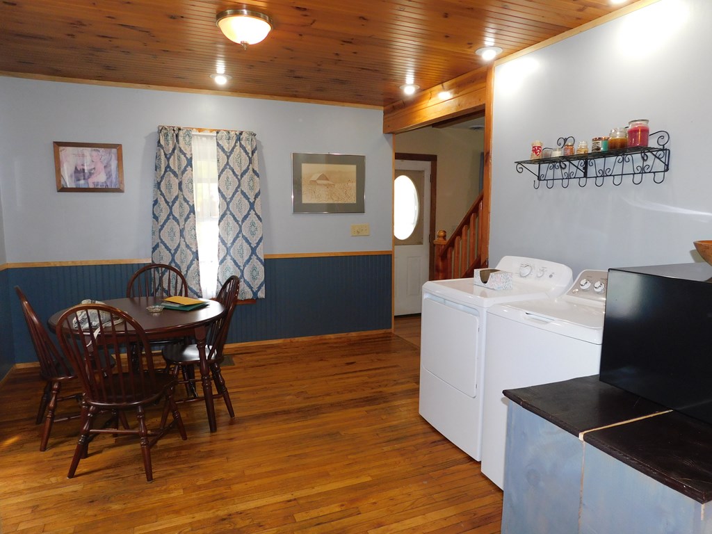 204 1st Avenue Rouseville, PA 16344 - Photo 5 of 37 a workspace with furniture and wooden floor