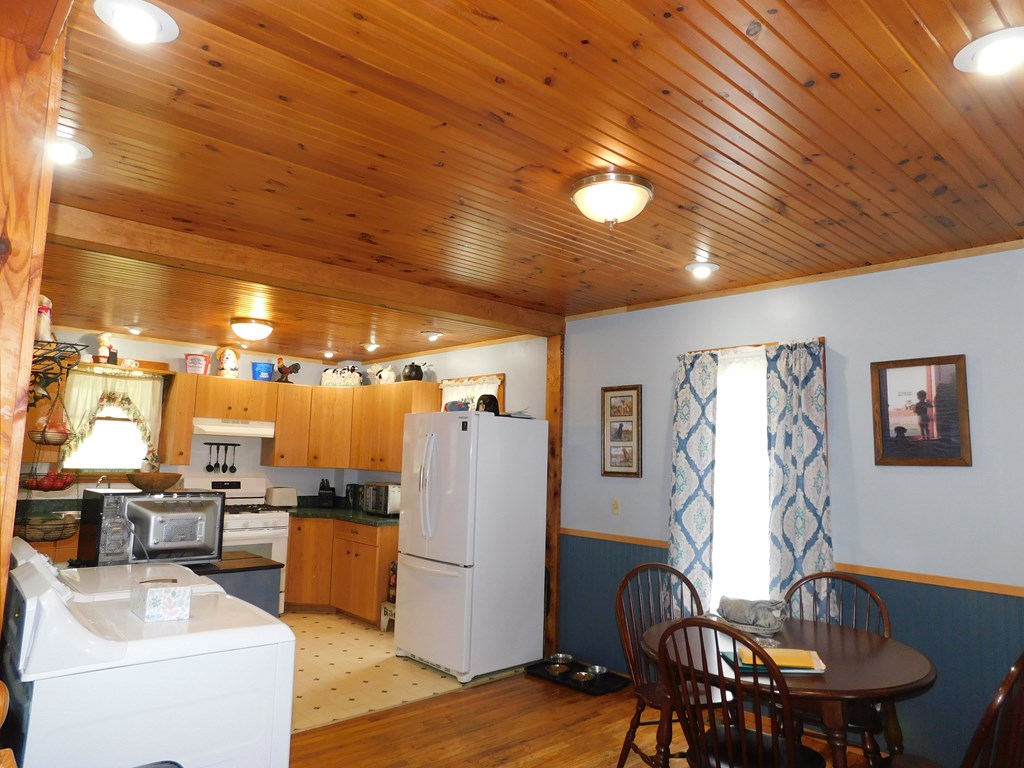 204 1st Avenue Rouseville, PA 16344 - Photo 6 of 37 a view of a livingroom with furniture and kitchen view
