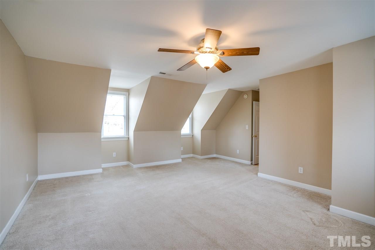9905 Rimwood Court Raleigh, NC 27613 - Photo 23 of 24 a view of an empty room with a window