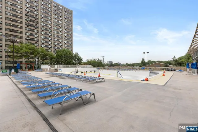 a view of a building with sitting area