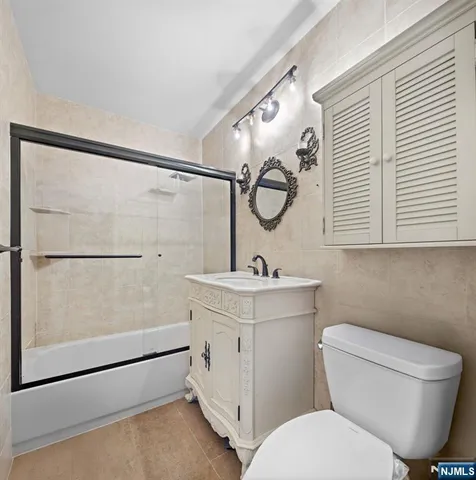 a view of a balcony with an outdoor seating