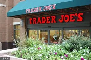 a view of a building with sitting area