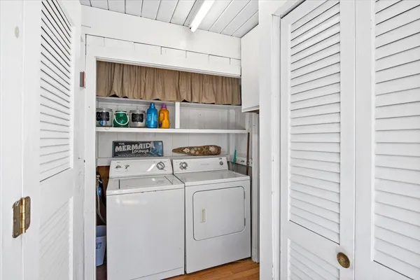 a utility room with dryer and washer