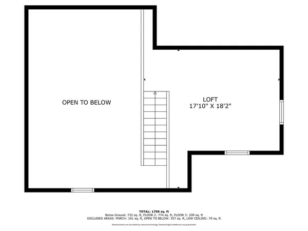 a view of a large body of water with a tree
