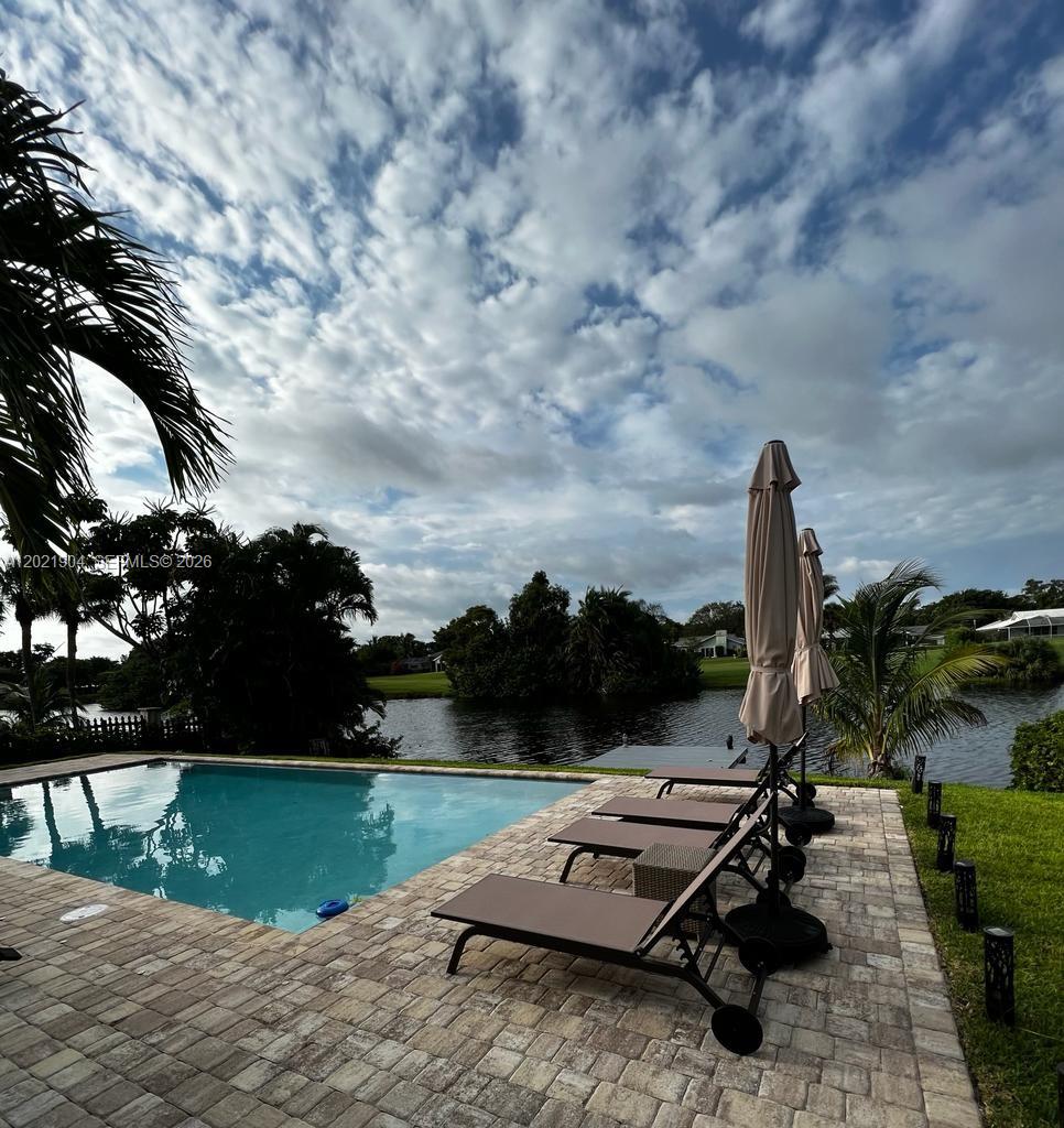 3324 Lakeview Boulevard Delray Beach, FL 33445 - Photo 16 of 36 a view of a terrace with chairs