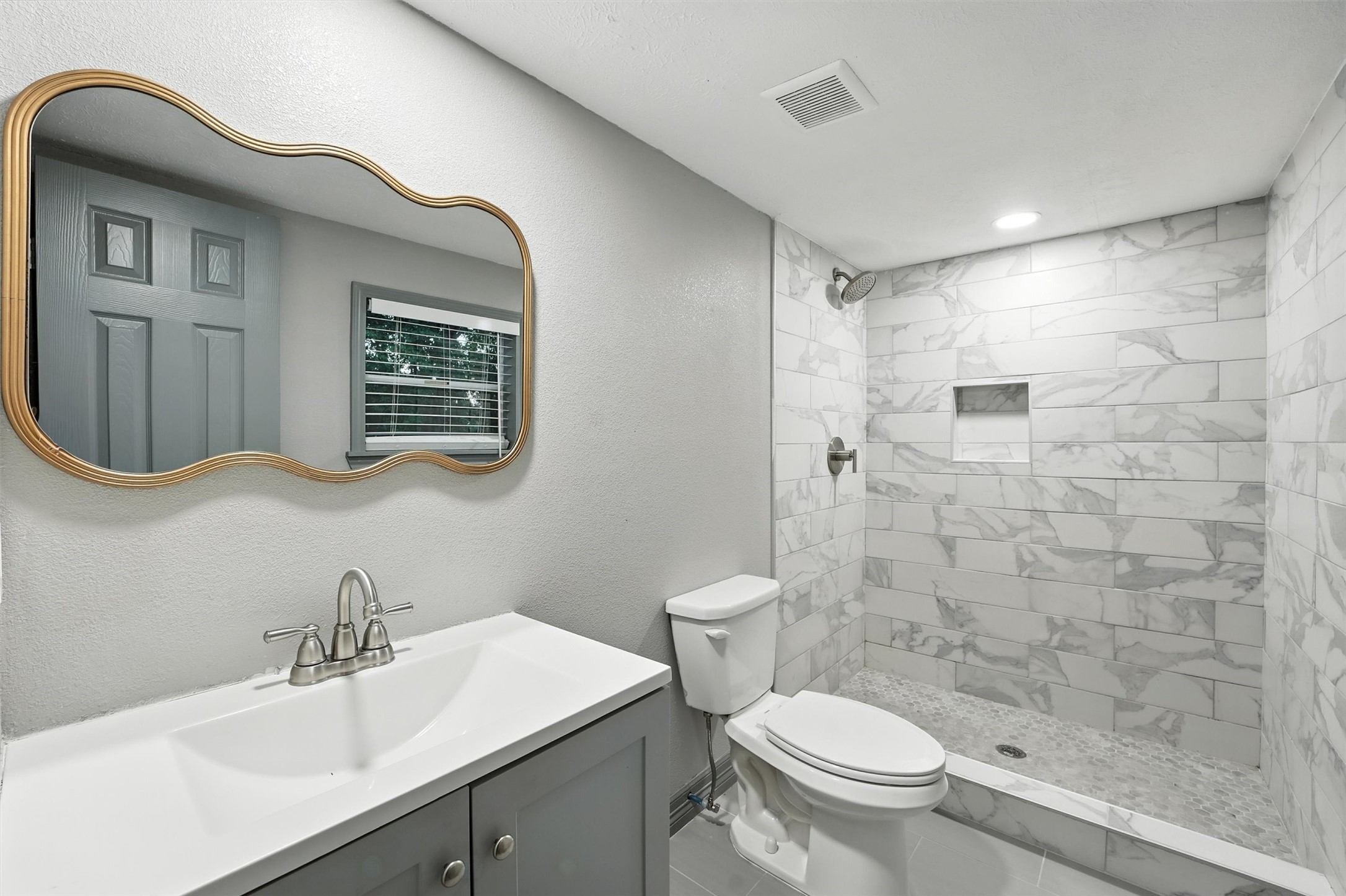 110 Robin Street Shepherd, TX 77371 - Photo 20 of 23 a bathroom with a sink a toilet and shower