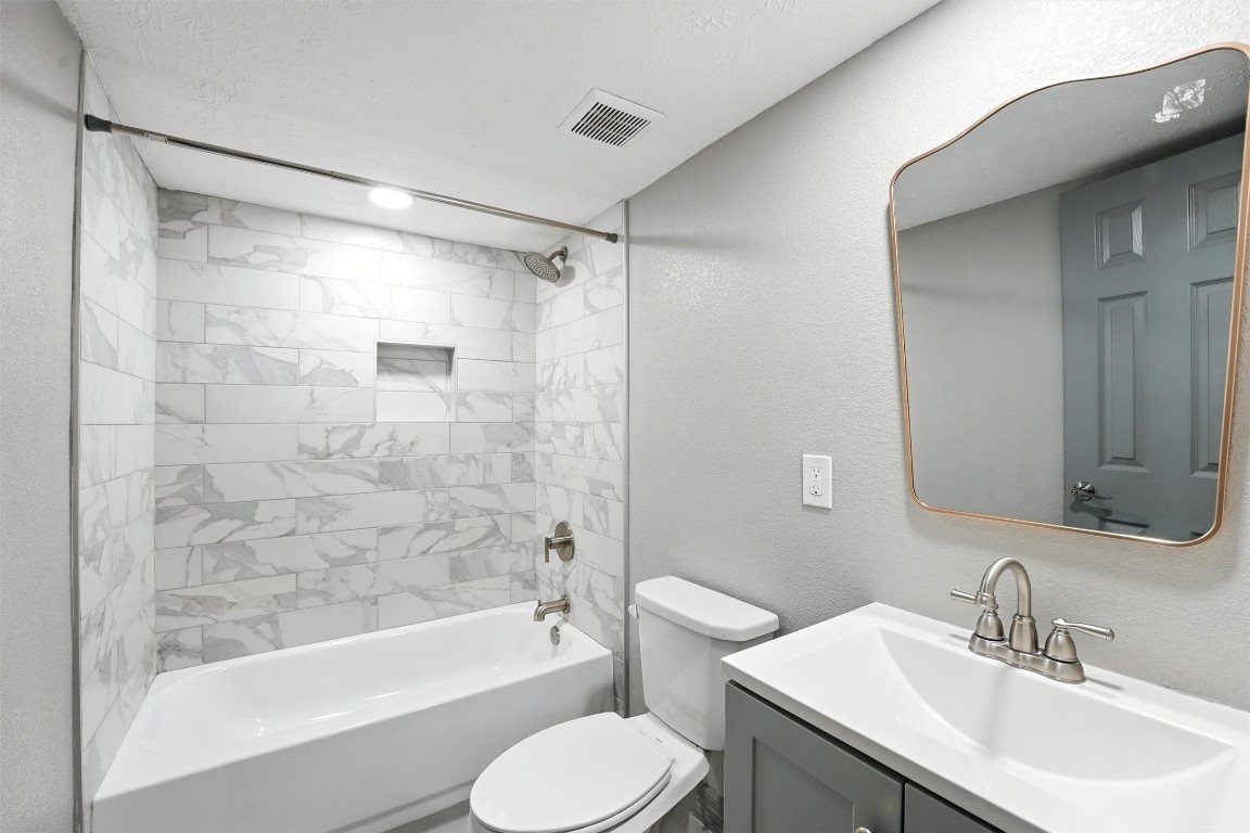 110 Robin Street Shepherd, TX 77371 - Photo 21 of 23 a bathroom with a sink toilet and shower