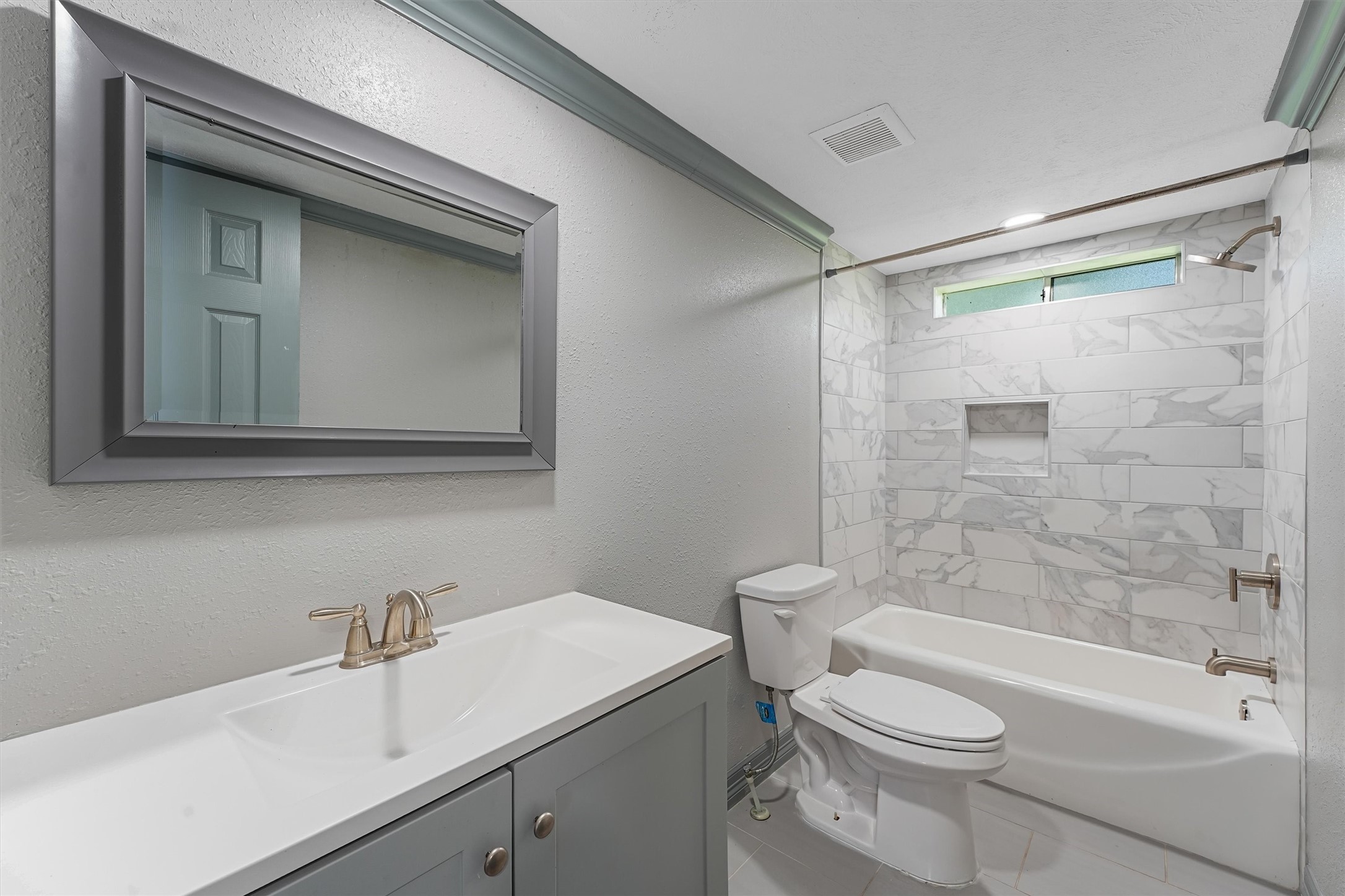 110 Robin Street Shepherd, TX 77371 - Photo 4 of 23 a bathroom with a sink a toilet and shower