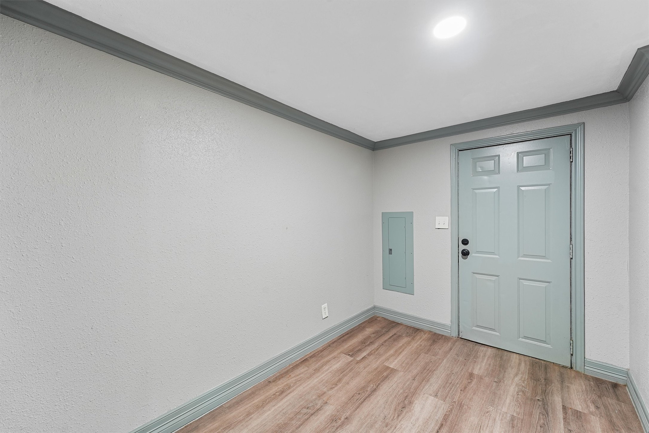 110 Robin Street Shepherd, TX 77371 - Photo 10 of 23 a view of an empty room with wooden floor
