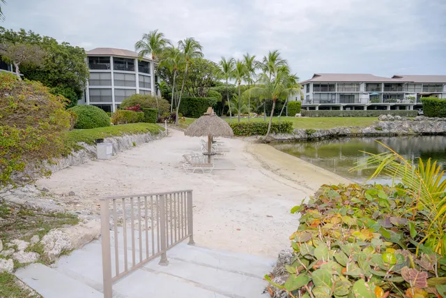 a view of a lake with a house