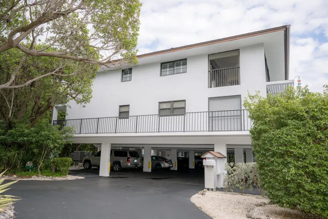 a view of house with a street