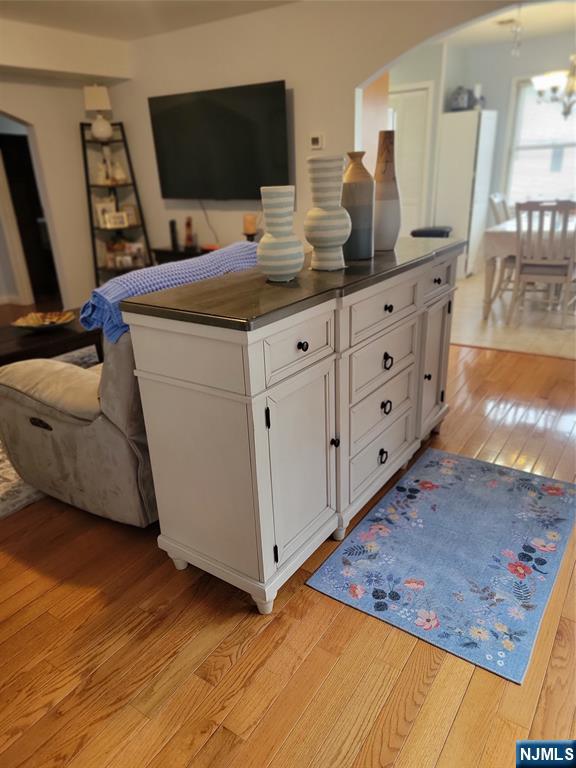 63-69 Rome Street Newark, NJ 07105 - Photo 3 of 11 a room with cabinets and flat screen tv