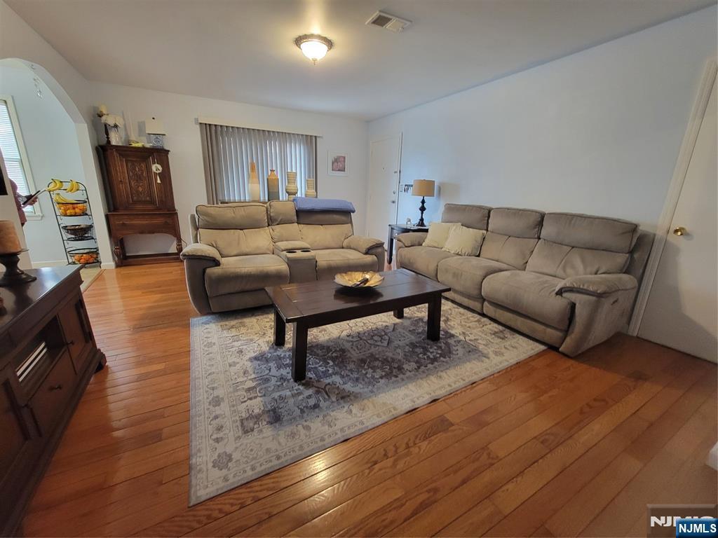 63-69 Rome Street Newark, NJ 07105 - Photo 4 of 11 a living room with furniture and a couch