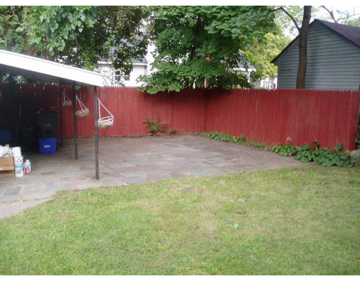 71 Edgemont Street Springfield, MA 01109 - Photo 3 of 3 a backyard of a house with lots of green space