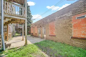 a brick building with a large windows