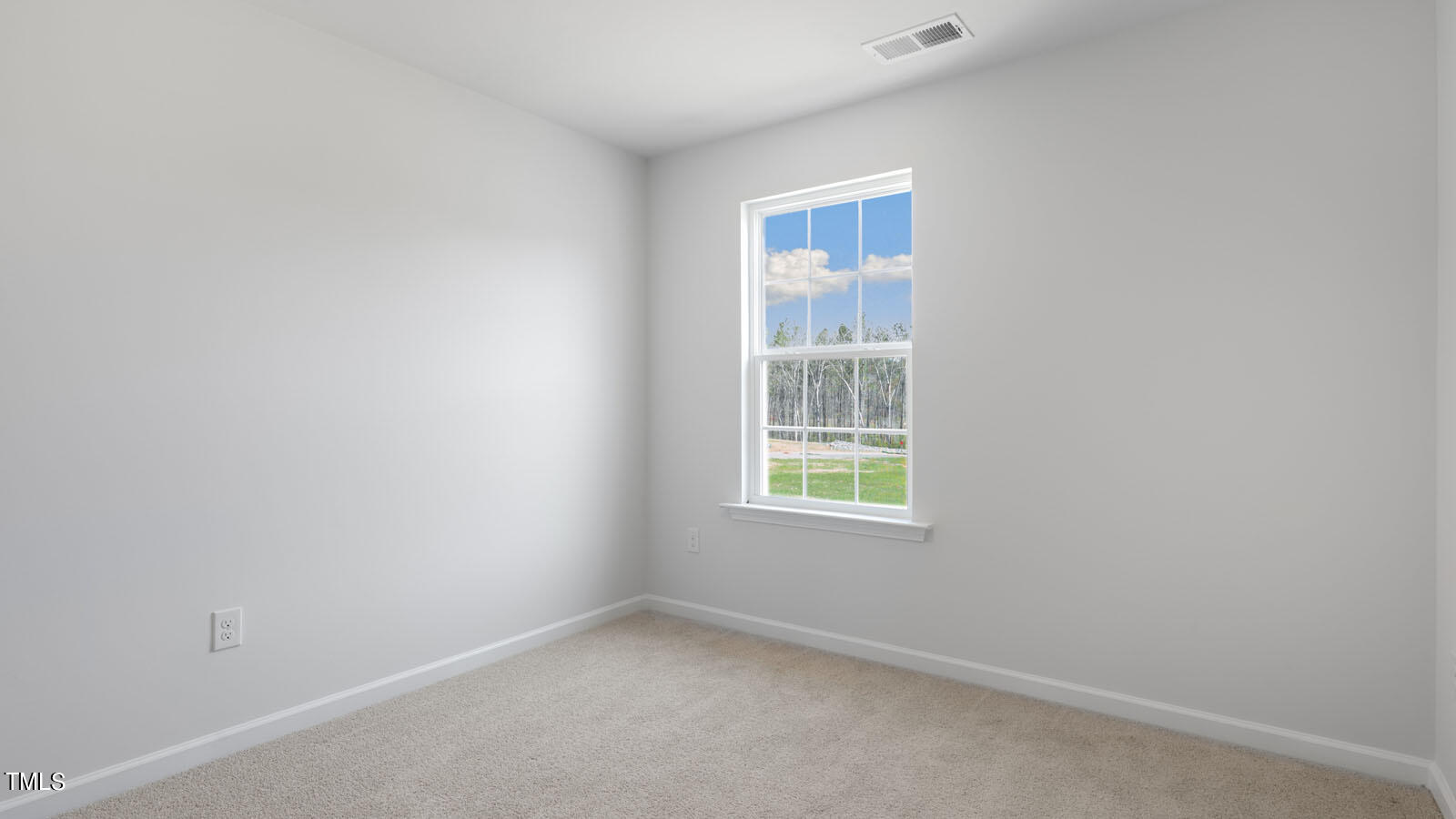 361 Ashley Run Sanford, NC 27330 - Photo 31 of 46 an empty room with a window