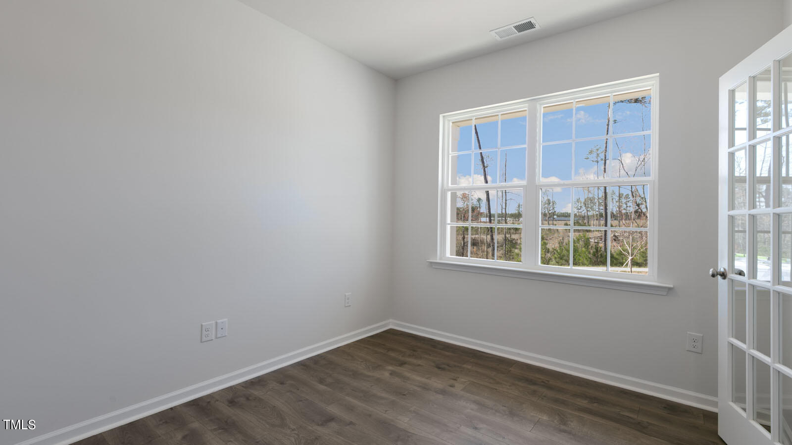 361 Ashley Run Sanford, NC 27330 - Photo 7 of 46 an empty room with a window