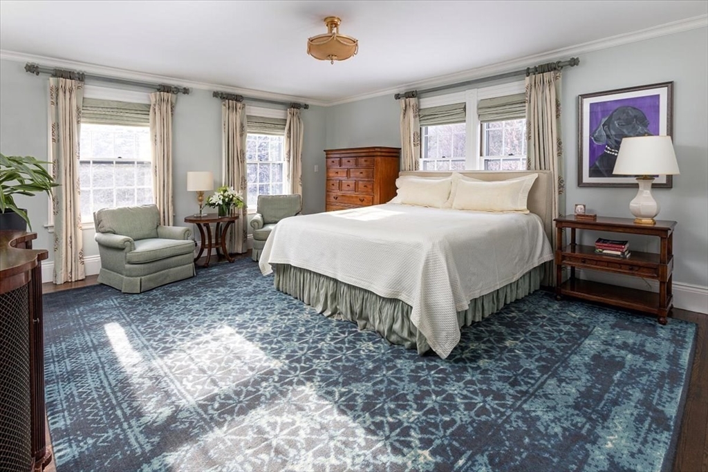 394 Hammond Street Newton, MA 02467 - Photo 11 of 24 a bedroom with a bed and glass window