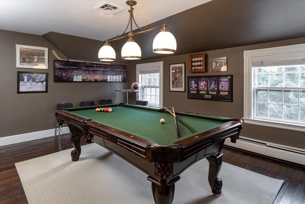 394 Hammond Street Newton, MA 02467 - Photo 16 of 24 a room with pool table and windows