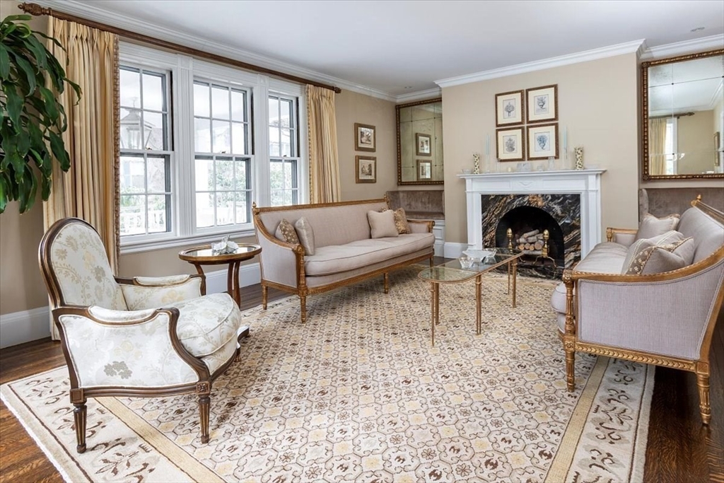 394 Hammond Street Newton, MA 02467 - Photo 2 of 24 a living room with furniture and a fireplace