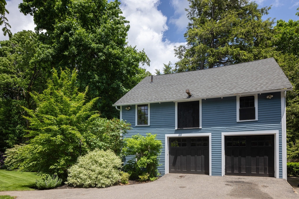 394 Hammond Street Newton, MA 02467 - Photo 22 of 24 front view of a house with a tree