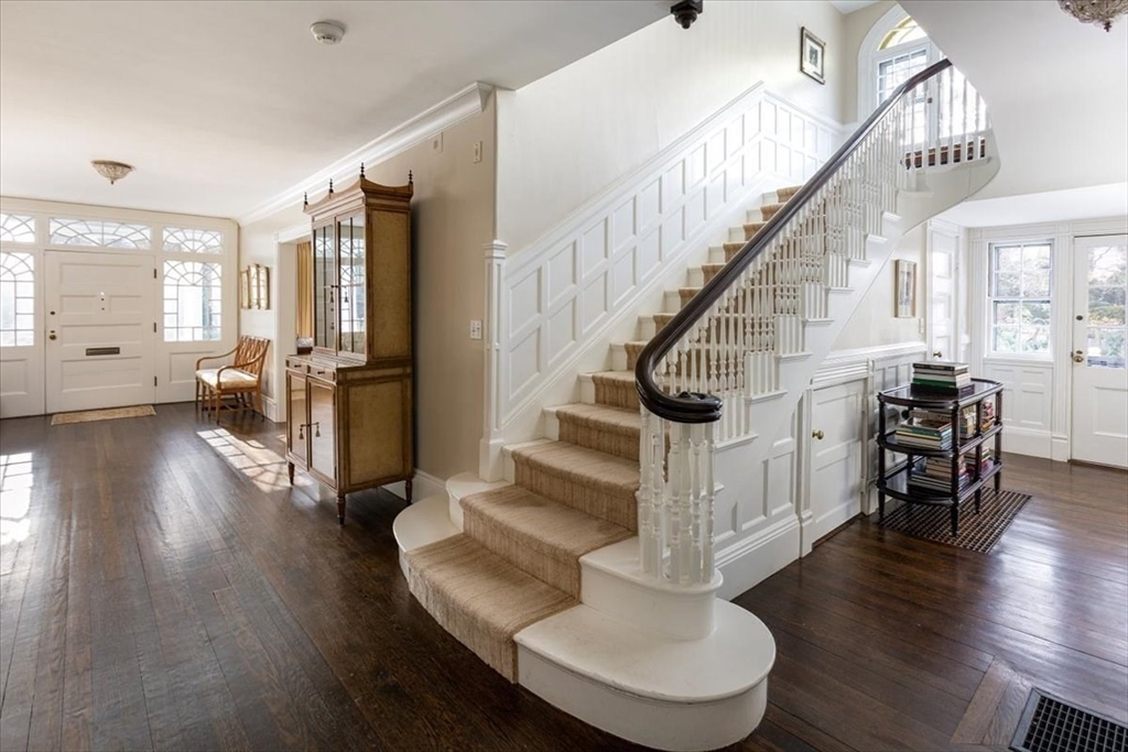 394 Hammond Street Newton, MA 02467 - Photo 10 of 24 a view of entryway and hall with wooden floor