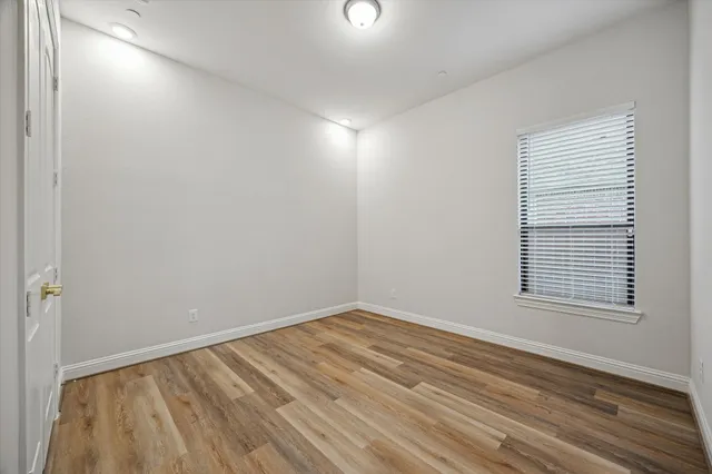 a view of a livingroom with wooden floor
