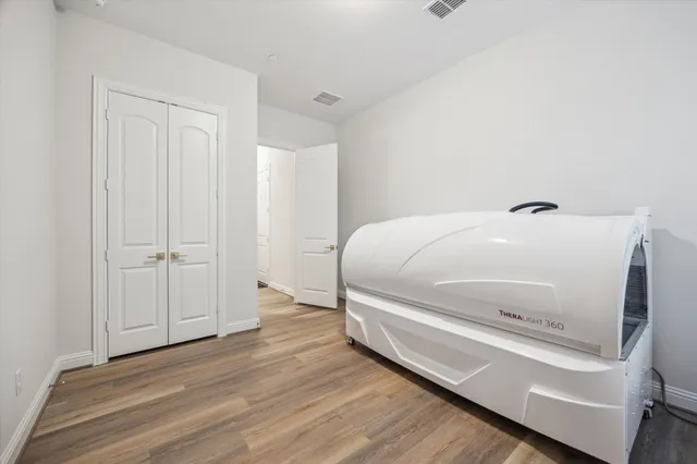 a dinning table and chairs in a room