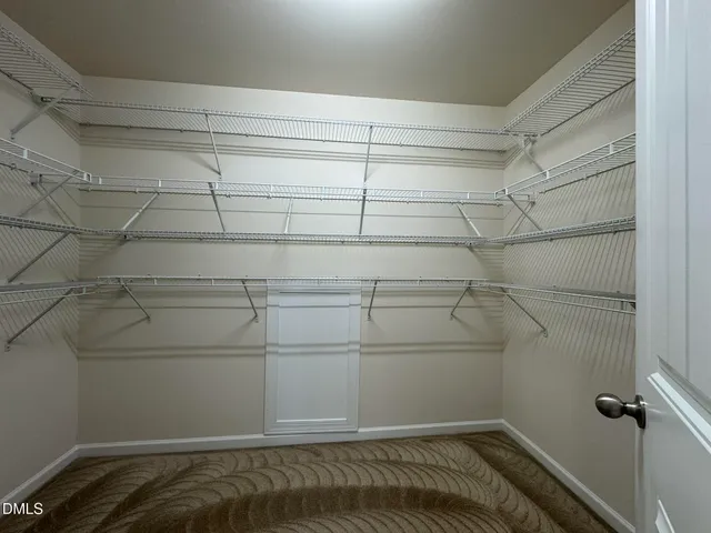 a view of a room with racks on the wall