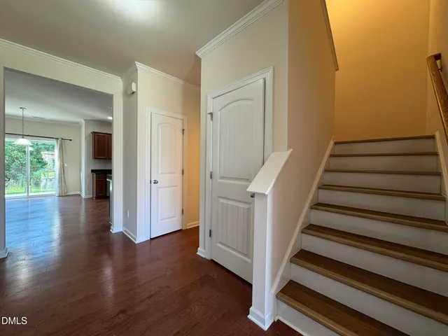 a view of entryway with wooden floor