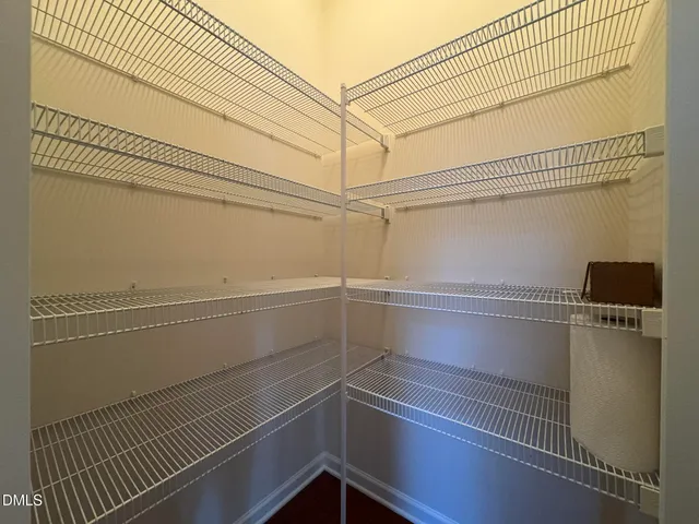 a view of a room with racks on the wall