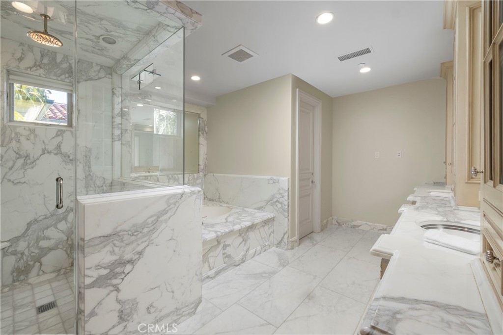 2258 Channel Road Newport Beach, CA 92661 - Photo 30 of 54 a bathroom with a tub shower and sink