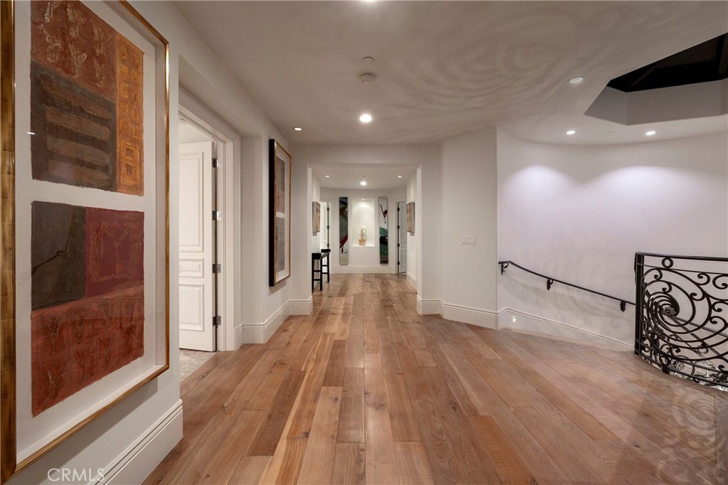 2258 Channel Road Newport Beach, CA 92661 - Photo 34 of 54 a view of a hallway with wooden floor