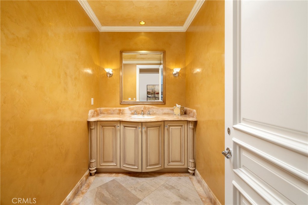 2258 Channel Road Newport Beach, CA 92661 - Photo 46 of 54 a bathroom with a sink and a mirror