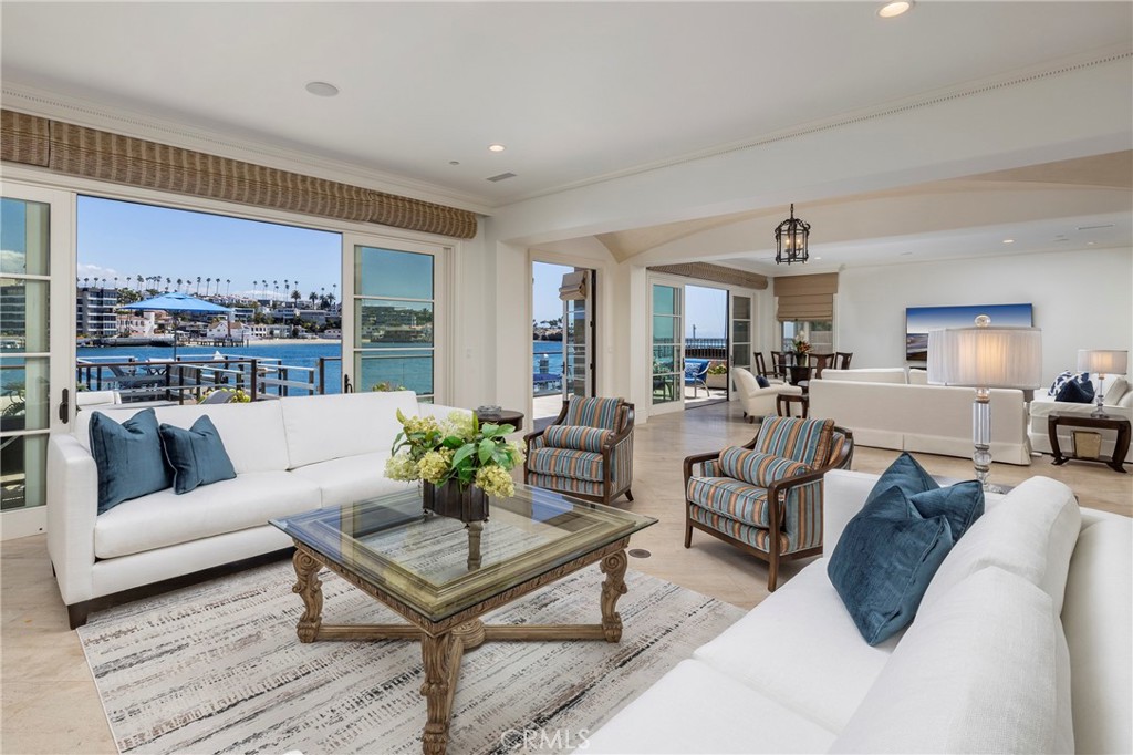 2258 Channel Road Newport Beach, CA 92661 - Photo 7 of 54 a living room with furniture and a view of kitchen
