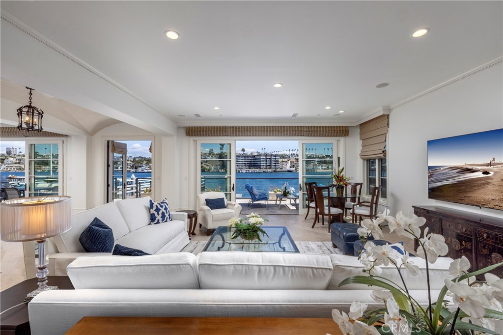2258 Channel Road Newport Beach, CA 92661 - Photo 8 of 54 a living room with furniture and a large window