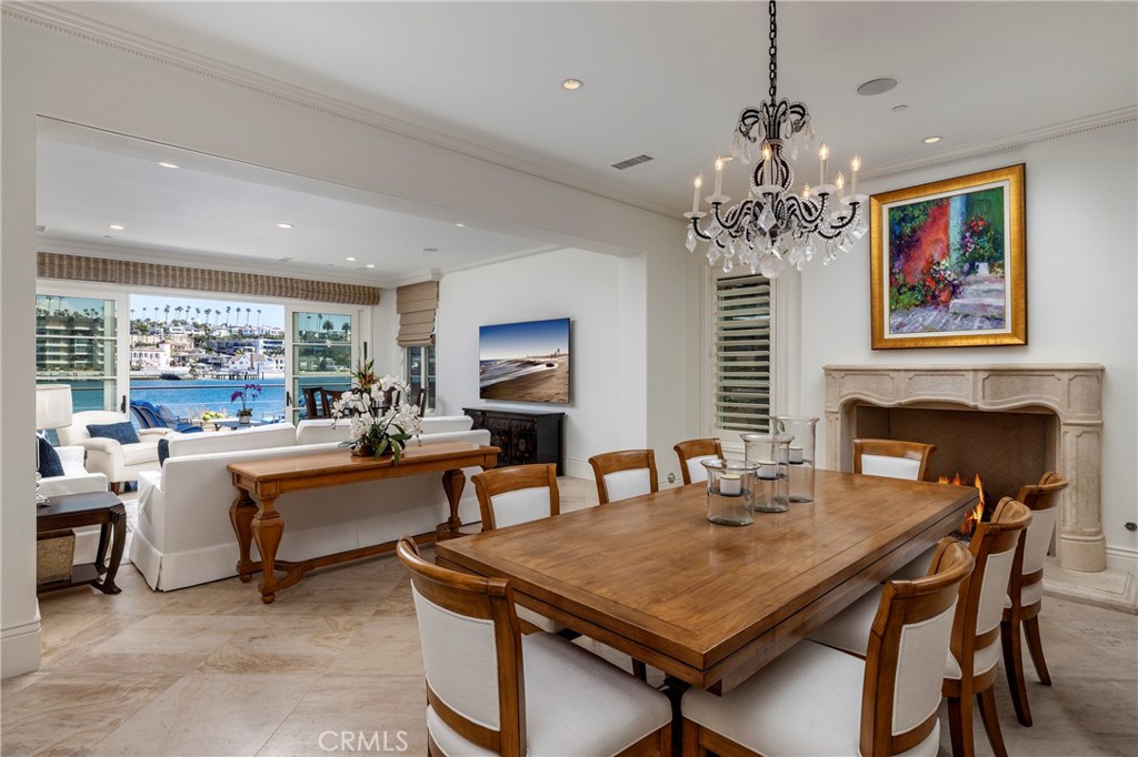 2258 Channel Road Newport Beach, CA 92661 - Photo 10 of 54 a view of a dining room with furniture window and wooden floor