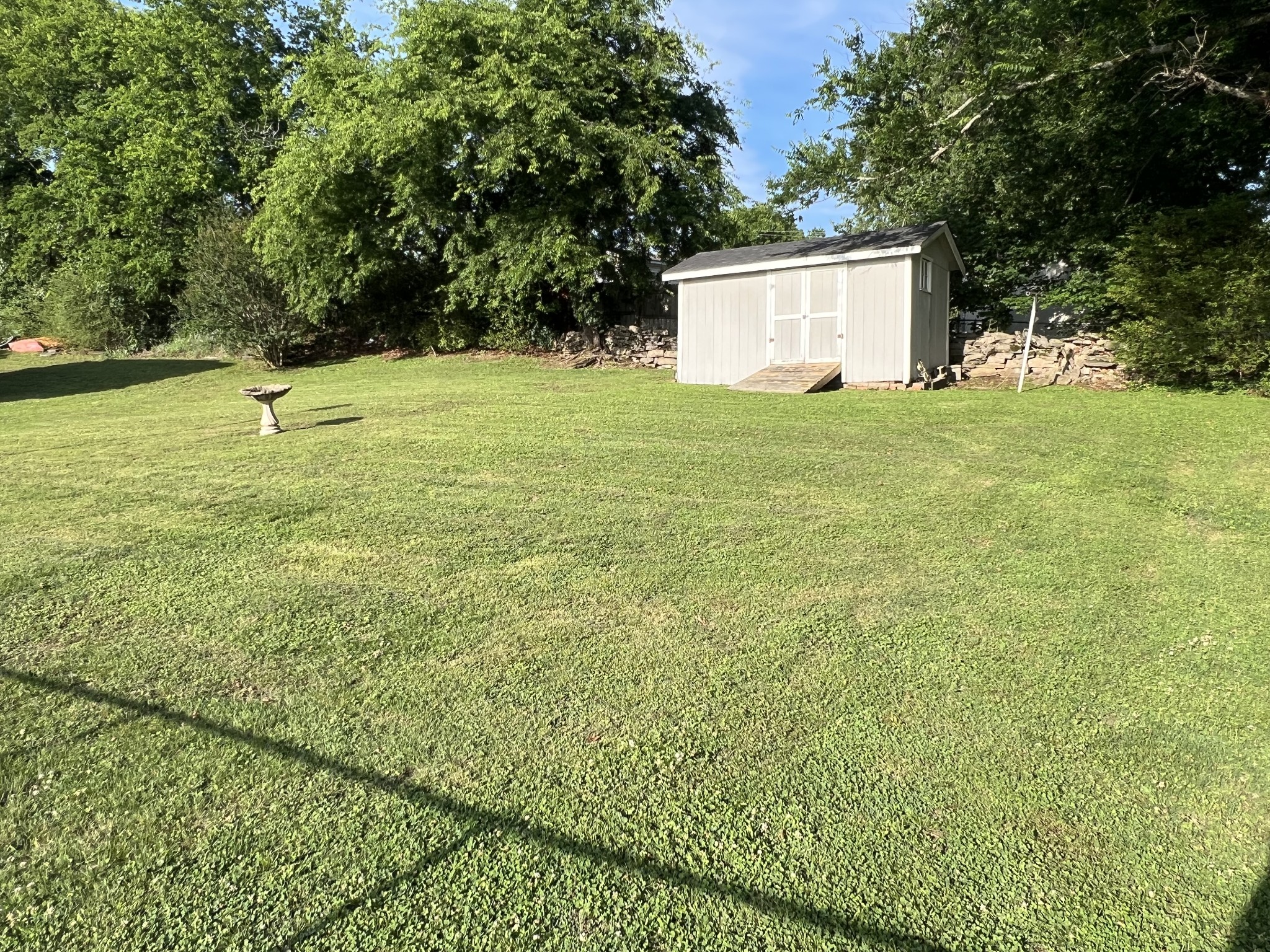 105 Tollgate Road Pulaski, TN 38478 - Photo 34 of 38 a view of a white house with a yard