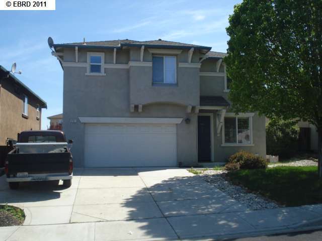 4107 Mt Isabel Road Antioch, CA 94531 - Photo 1 of 1 a front view of a house with a yard