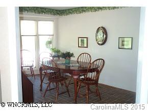 72 Vintage Road Tryon, NC 28782 - Photo 2 of 7 a view of a dining room with furniture and window