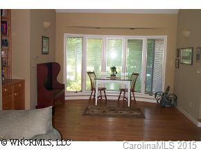 72 Vintage Road Tryon, NC 28782 - Photo 6 of 7 a dining room with furniture and wooden floor