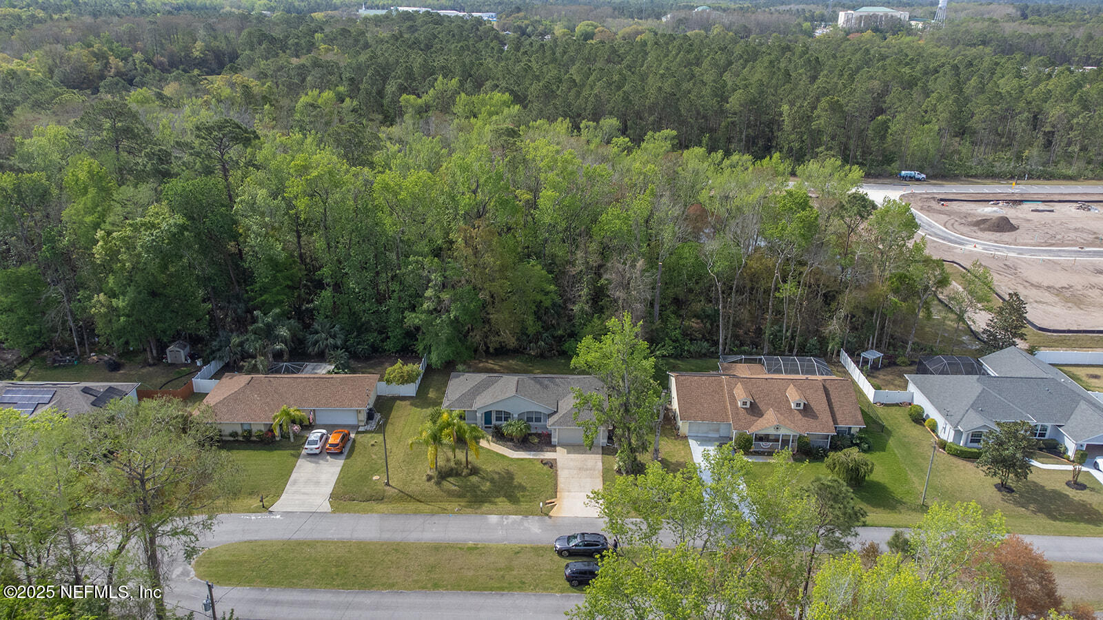 29 Edith Pope Drive Palm Coast, FL 32164 - Photo 2 of 26 an aerial view of a house with a garden